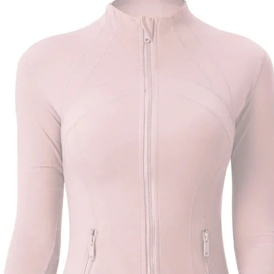 Pale pink fitted zip-up jacket with a stand collar and curved seams across the chest